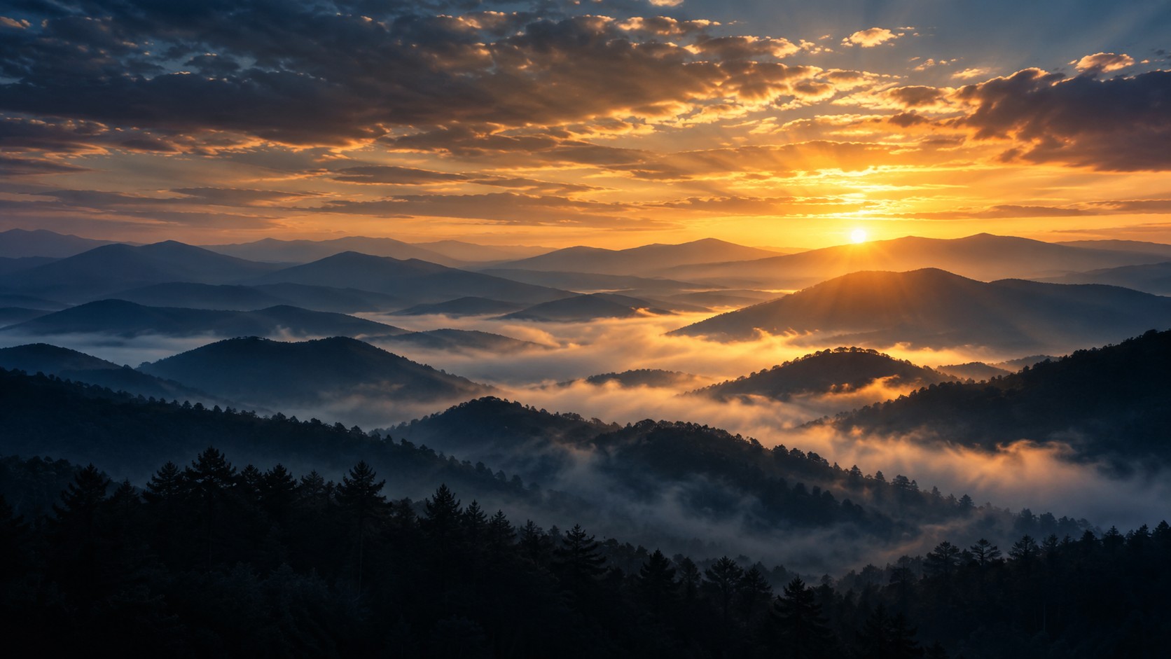 Golden sunrise over the layered Blue Ridge Mountains